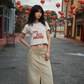 Vintage-washed 'My Own Muse' cropped graphic t-shirt with star print, lettuce-edge hem, and relaxed fit